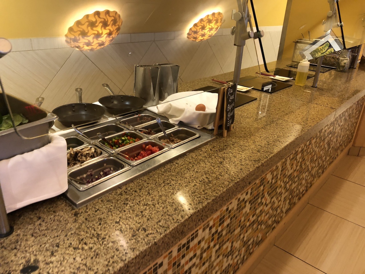 Hilton Orlando Bonnet Creek Resort is at Disney's Doorstep Hawaii Calling Omelet station