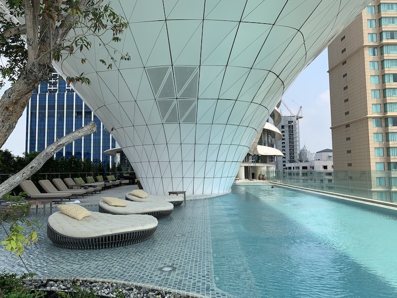 Waldorf-Astoria Bangkok - Superior Luxury Hotel Hawaii Calling Pool deck with loungers