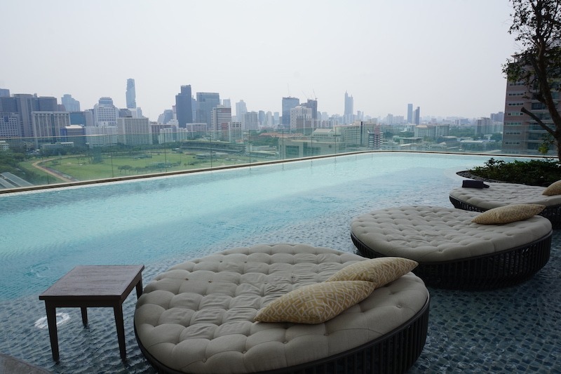 Waldorf-Astoria Bangkok - Superior Luxury Hotel Hawaii Calling Pool deck with views of Bangkok