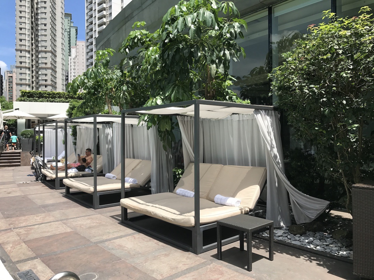 Conrad Hong Kong: White-Glove Luxury Hawaii Calling Resort-style loungers