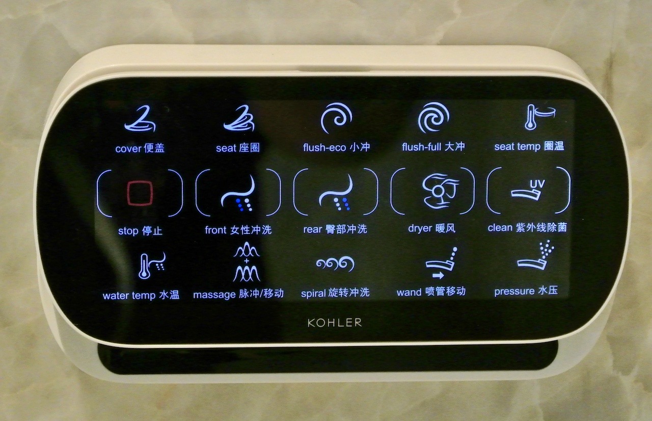St. Regis Shanghai Jingan Offers Classic Luxury Hawaii Calling Controls for bidet seat in master toilet