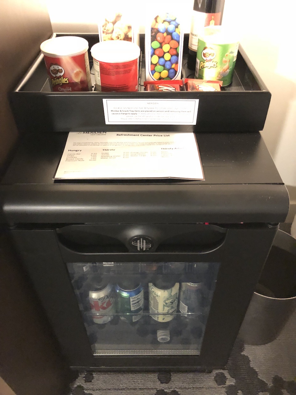 Le Meridien New Orleans - Polished Business Hotel Hawaii Calling Mini fridge and snacks