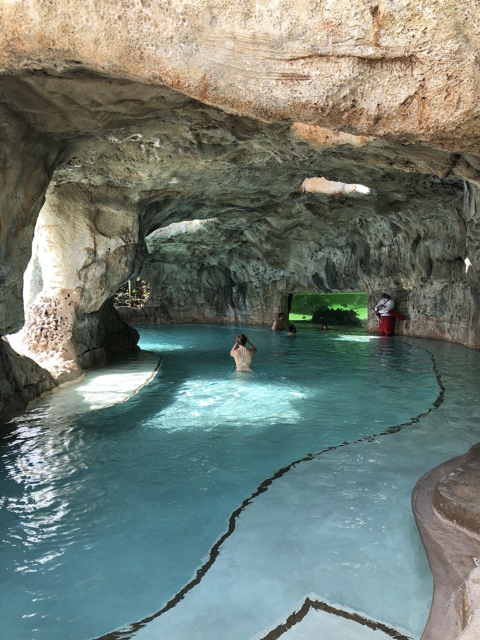Grand Hyatt Baha Mar, Bahamas Hawaii Calling Grotto with aquarium view of nurse sharks and rays