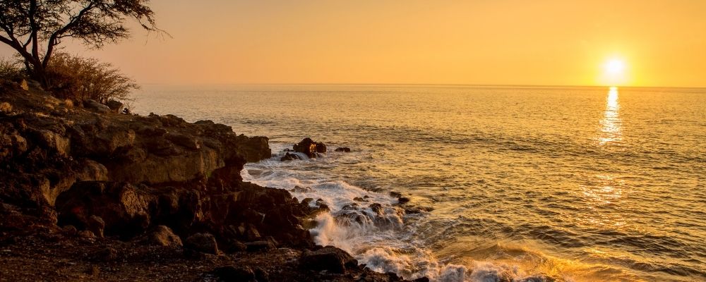 The 27 Best Luaus In Hawaii - By Island (2025) Hawaii Calling Sunset off Kohala Coast for best luau in Big Island