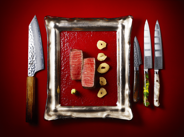 Ultimate Guide to Marriott Bonvoy Moments for 2023 Hawaii Calling a plate of meat and knifes