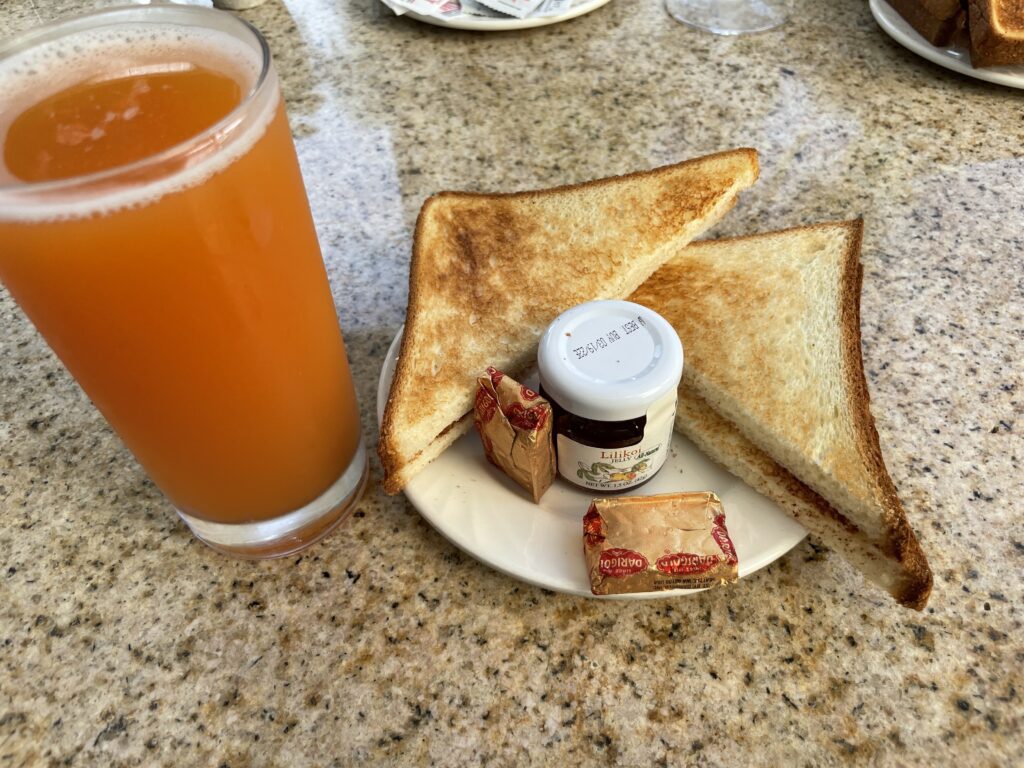 Sheraton Princess Kaiulani Hotel - Video & Review Hawaii Calling a plate of toast and jam on a table