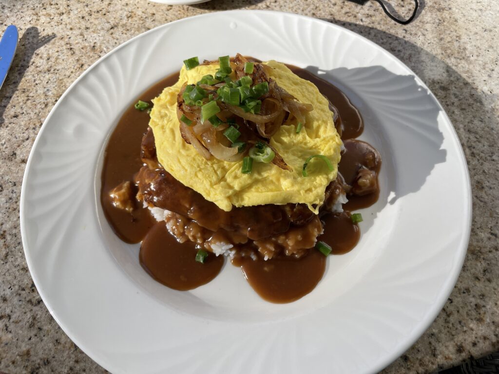 Sheraton Princess Kaiulani Hotel - Video & Review Hawaii Calling a plate of food with a omelette on top