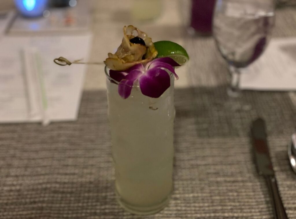 Review & Video: The Royal Hawaiian, Waikiki, A Luxury Collection Hotel Hawaii Calling a glass with a flower and lime on it