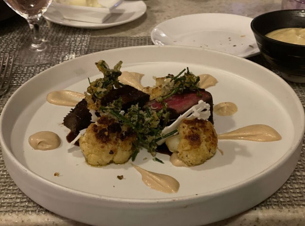Review & Video: The Royal Hawaiian, Waikiki, A Luxury Collection Hotel Hawaii Calling a plate of food on a table