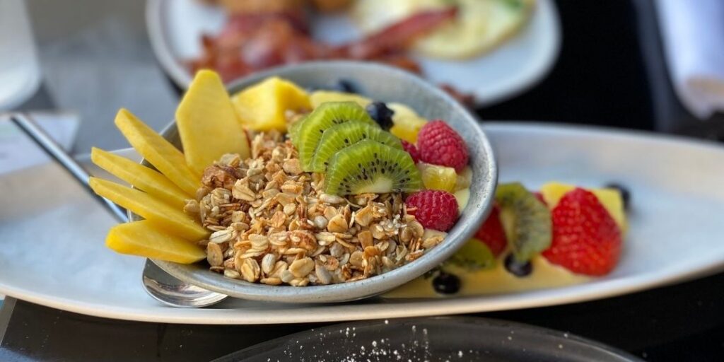 Review & Video: The Laylow Waikiki, Autograph Collection in Waikiki, Unique and Fun Hawaii Calling a bowl of fruit and cereal