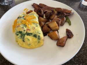 Review & Video: The Royal Hawaiian, Waikiki, A Luxury Collection Hotel Hawaii Calling a plate of food on a table