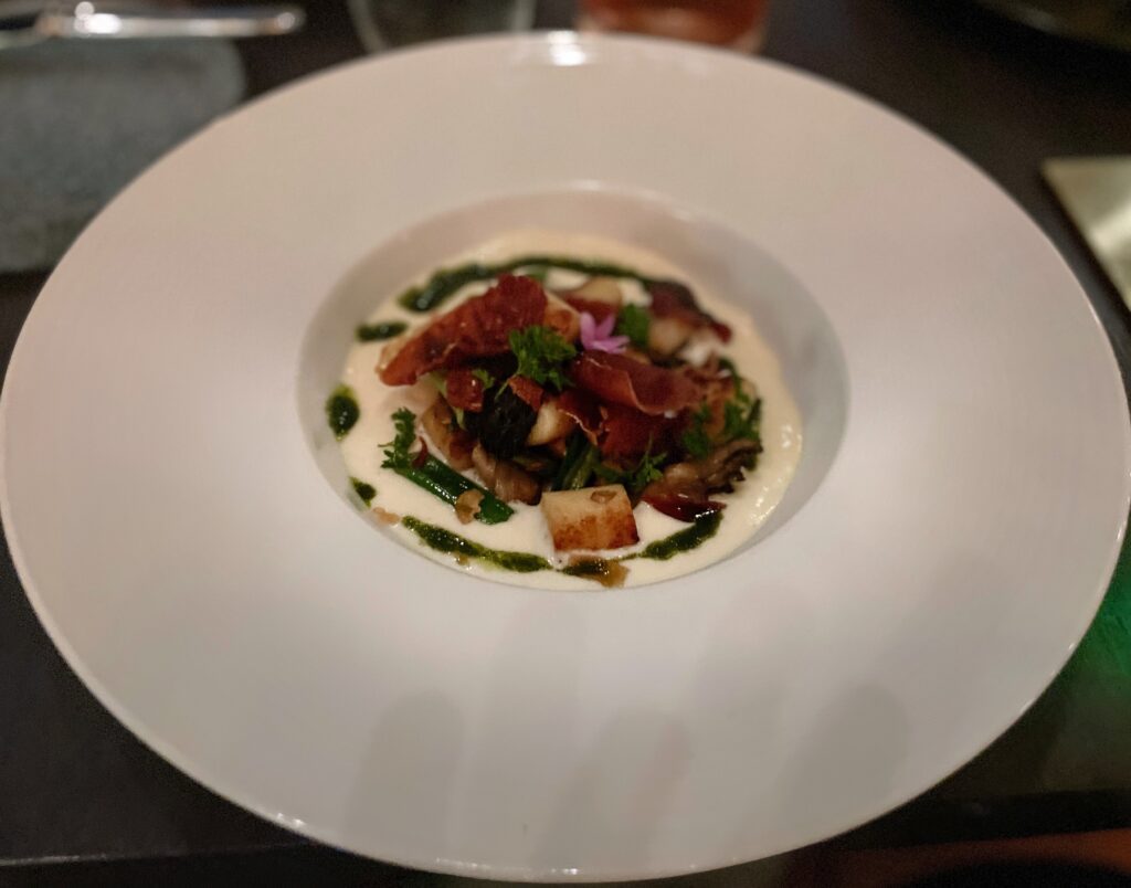 Review & Video: The Ritz-Carlton Waikiki Beach, Luxurious Residences & Hotel Hawaii Calling a plate of food on a table