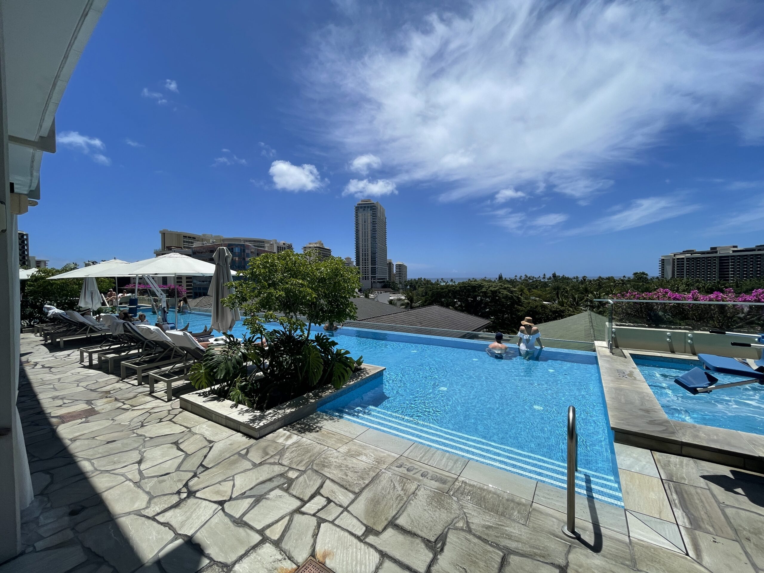 Review & Video: The Ritz-Carlton Waikiki Beach, Luxurious Residences & Hotel Hawaii Calling a pool with people in it