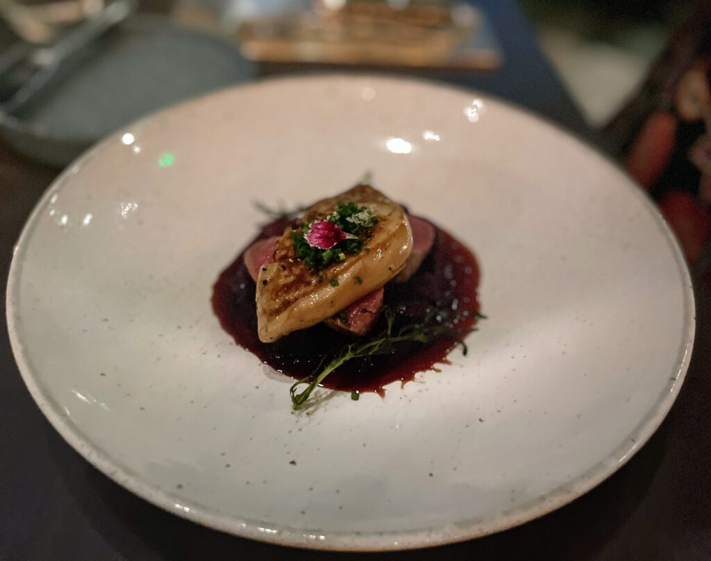 Review & Video: The Ritz-Carlton Waikiki Beach, Luxurious Residences & Hotel Hawaii Calling a plate of food on a table