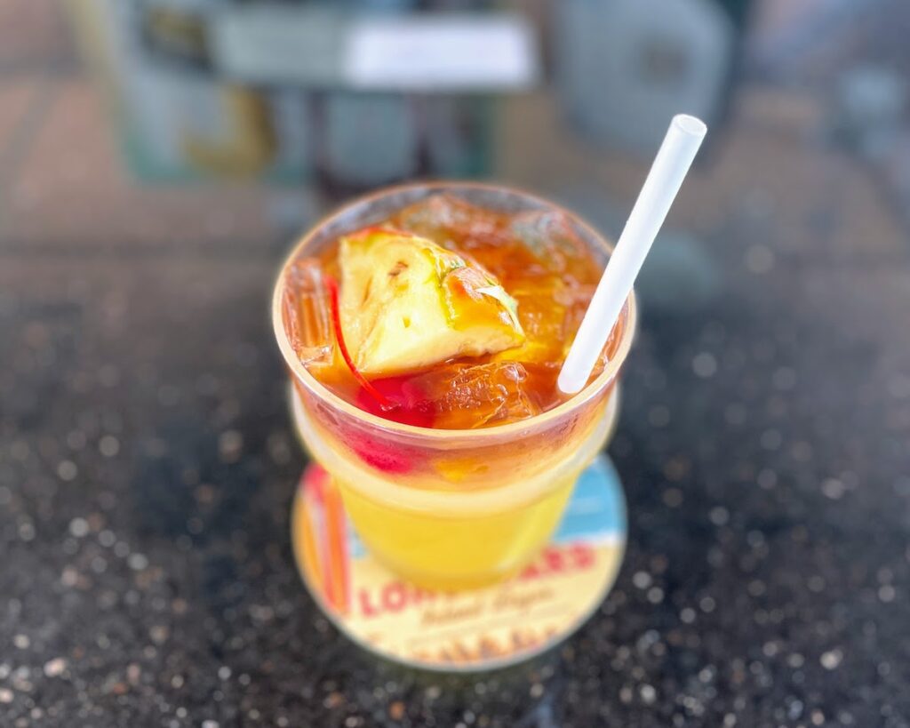 Review & Video: Courtyard King Kamehameha's Kona Beach Hotel Hawaii Calling a glass of liquid with a straw and fruit