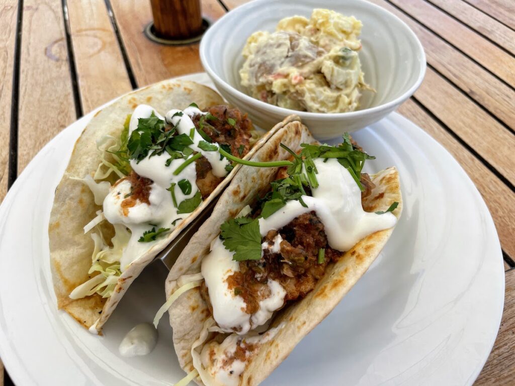 Review & Video: Mauna Kea Beach Hotel, Autograph Collection Hawaii Calling a plate of tacos with a bowl of potato salad