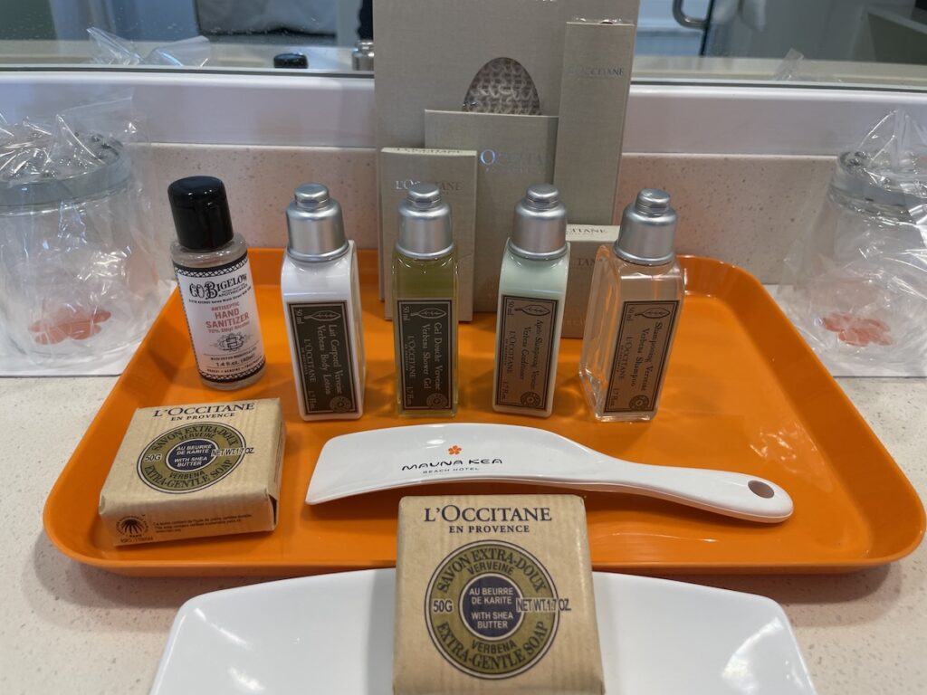 Review & Video: Mauna Kea Beach Hotel, Autograph Collection Hawaii Calling a tray with a variety of products on it