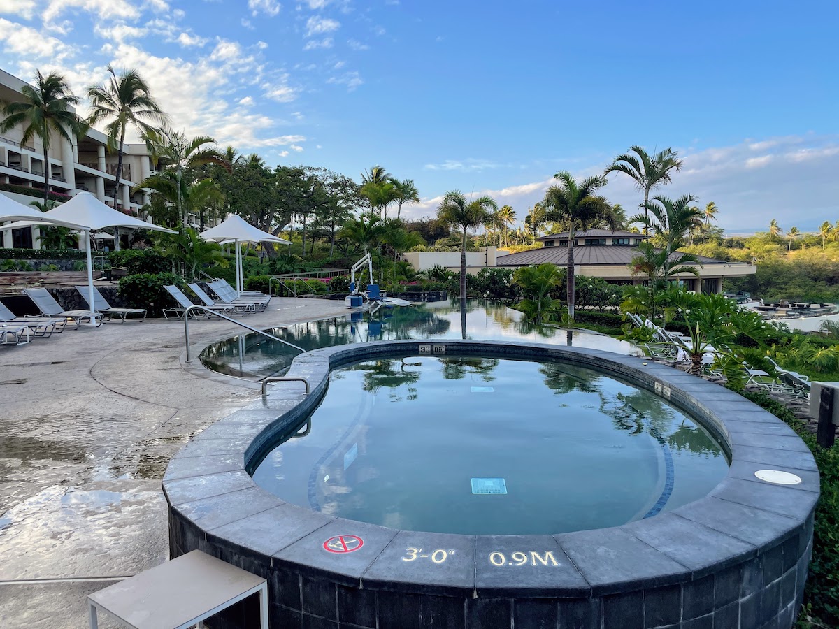 Review & Video: The Westin Hapuna Beach Resort Hawaii Calling a pool with a swimming pool and palm trees