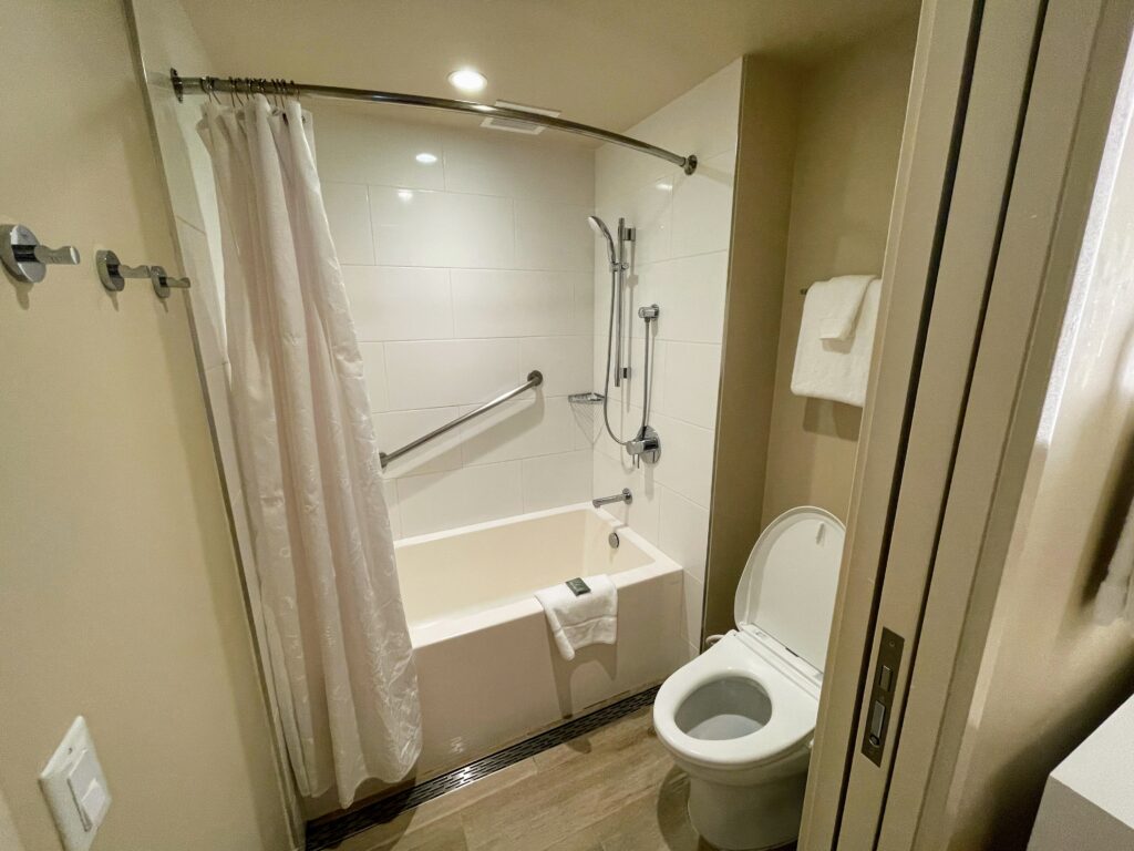 Review & Video: Sheraton Waikiki, Best Family Hotel on Oahu Hawaii Calling a bathroom with a toilet and bathtub