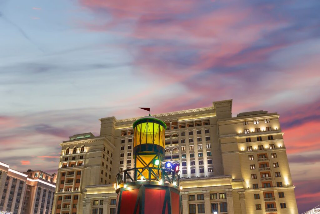 The Exclusive Four Seasons Preferred Partner Program Hawaii Calling a building with a tower in front of it