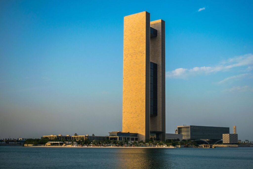 The Exclusive Four Seasons Preferred Partner Program Hawaii Calling a tall building next to water