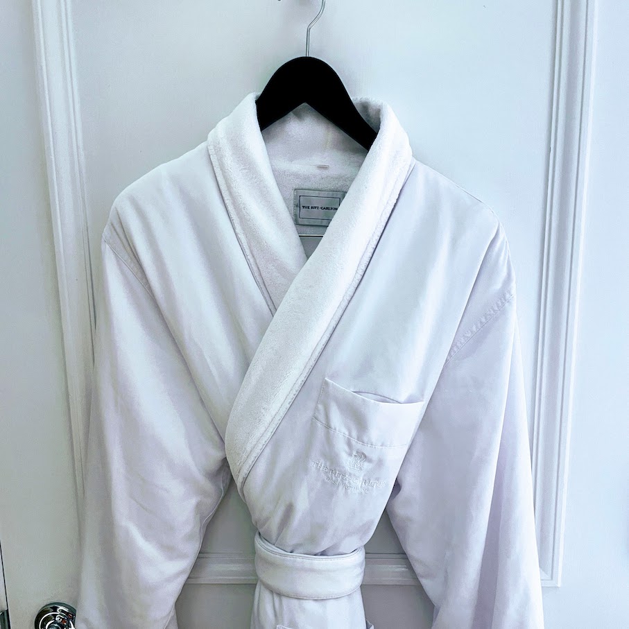 Review & Video: The Ritz-Carlton Washington DC, Refined Luxury Hawaii Calling a white robe on a door