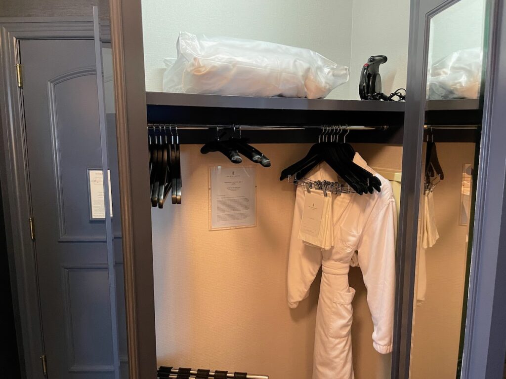 Review & Video: The Ritz-Carlton Washington DC, Refined Luxury Hawaii Calling a closet with white robe and swingers