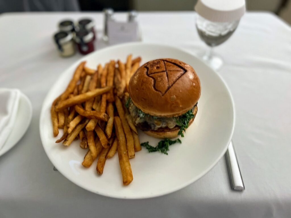 Review & Video: The Ritz-Carlton Washington DC, Refined Luxury Hawaii Calling a plate of food on a table