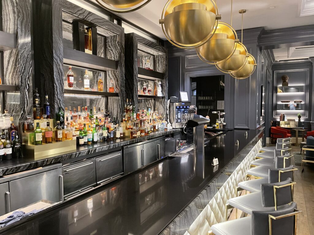 Review & Video: The Ritz-Carlton Washington DC, Refined Luxury Hawaii Calling a bar with many bottles of alcohol