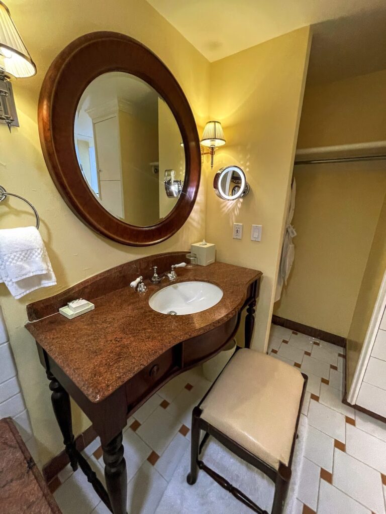 Review & Video: The Kahala Hotel and Resort, Presidential Luxury Hawaii Calling a bathroom with a round mirror and sink