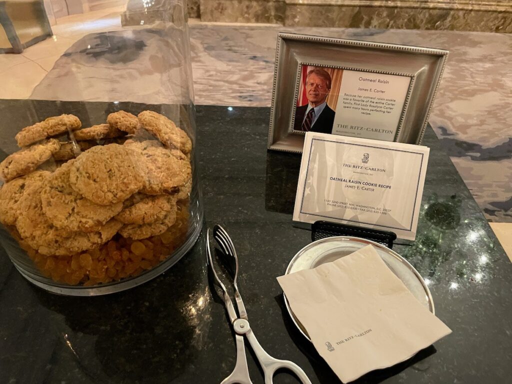 Review & Video: The Ritz-Carlton Washington DC, Refined Luxury Hawaii Calling Jar of President Jimmy Carters Favorite cookies next to his picture at the Ritz Carlton Washington DC