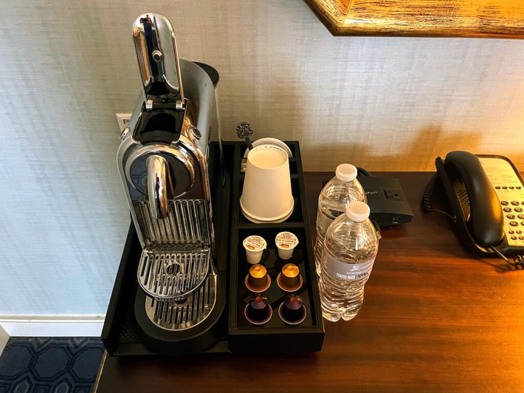 Review & Video: The St. Regis Washington DC, Historic Luxury Hawaii Calling a coffee machine and coffee capsules on a table