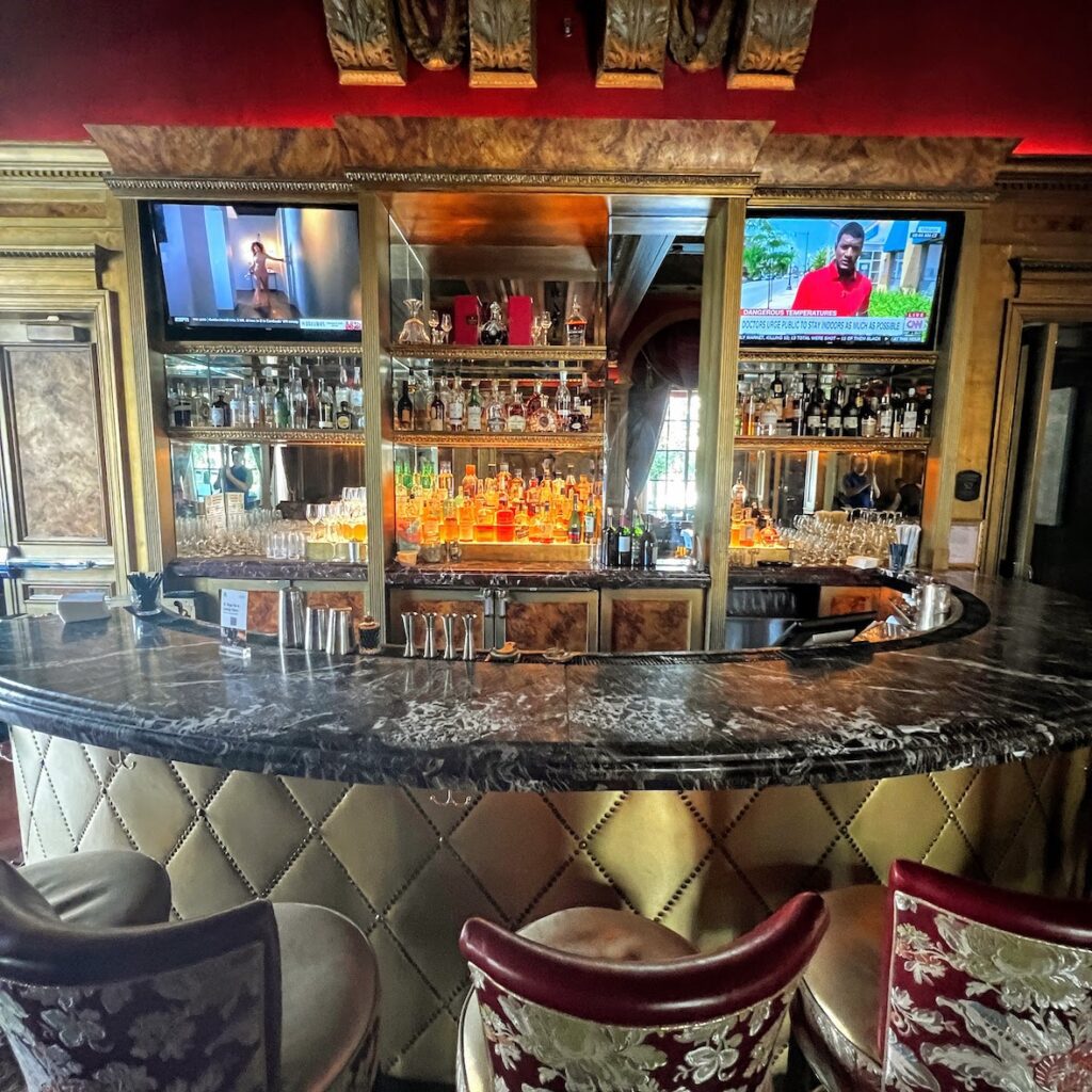 Review & Video: The St. Regis Washington DC, Historic Luxury Hawaii Calling a bar with a television and a bar