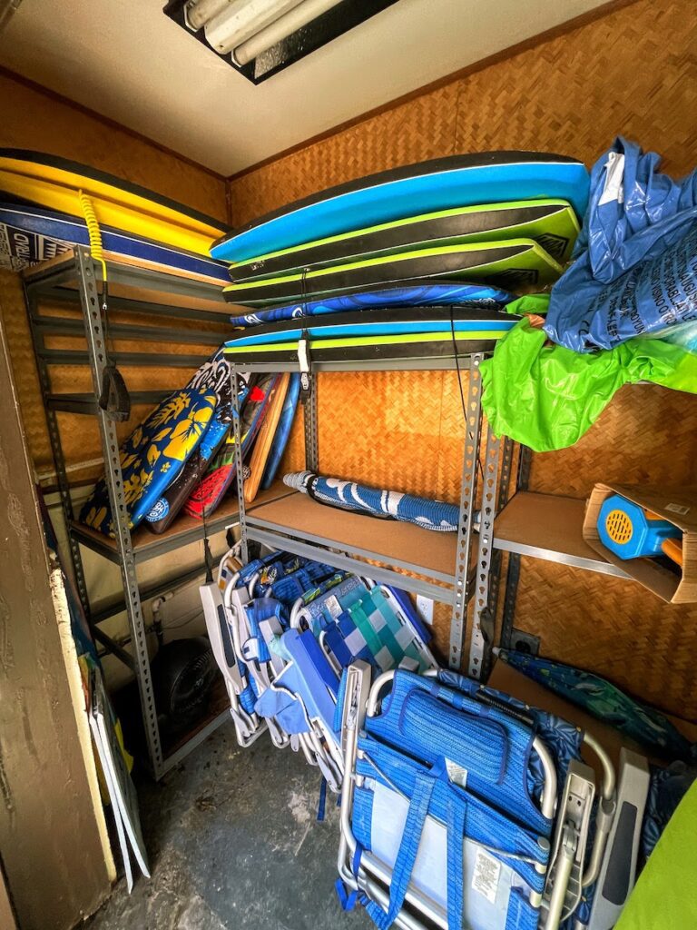 Review & Video: White Sands Hotel, Boutique & Smart Hawaii Calling a room with surfboards and other items