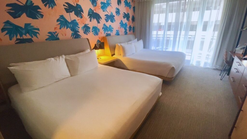 6 Amazing Boutique Hotels on Oahu (2025) Hawaii Calling 2 queen beds at the Laylow Waikiki, one of the best boutique hotels on Oahu