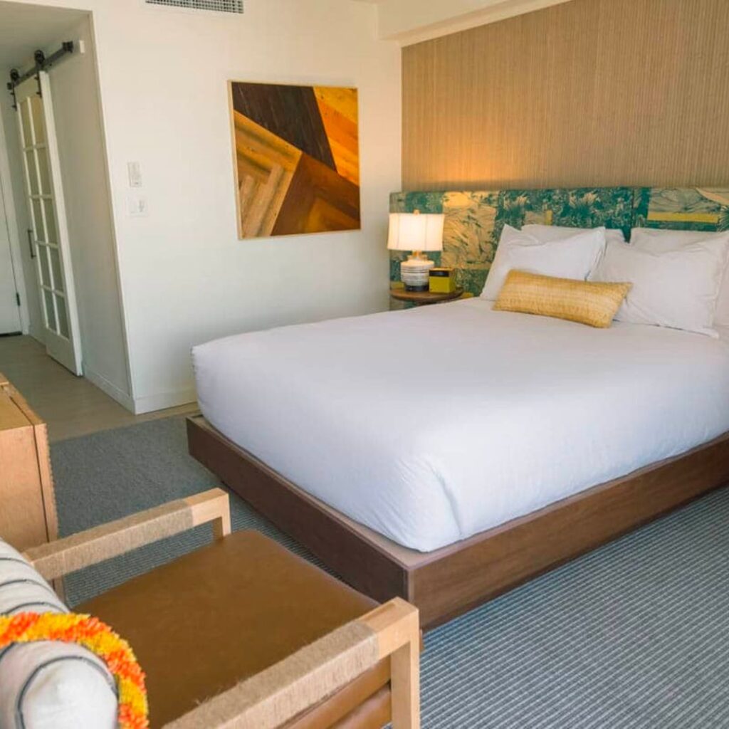 6 Amazing Boutique Hotels on Oahu (2025) Hawaii Calling a bed in a room