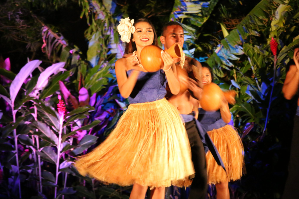The 27 Best Luaus In Hawaii - By Island (2025) Hawaii Calling a group of people dancing on a stage