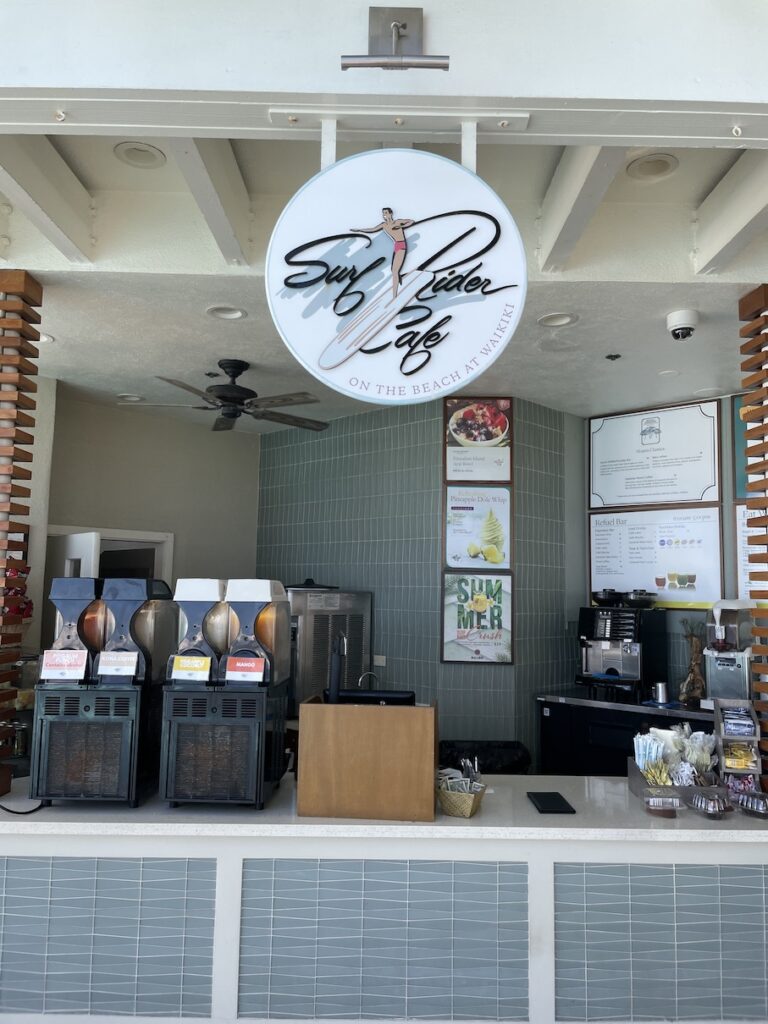 Review & Video: Moana Surfrider, Waikiki Beach Beauty Hawaii Calling a sign above a counter