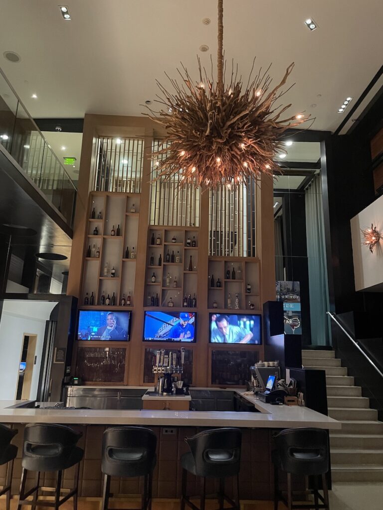 Review & Video: Hotel Republic San Diego, Autograph Collection Hawaii Calling a room with a bar and a chandelier