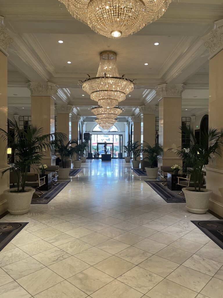 Review & Video: The US Grant, San Diego, a Luxury Collection Hotel Hawaii Calling a hallway with chandeliers and plants