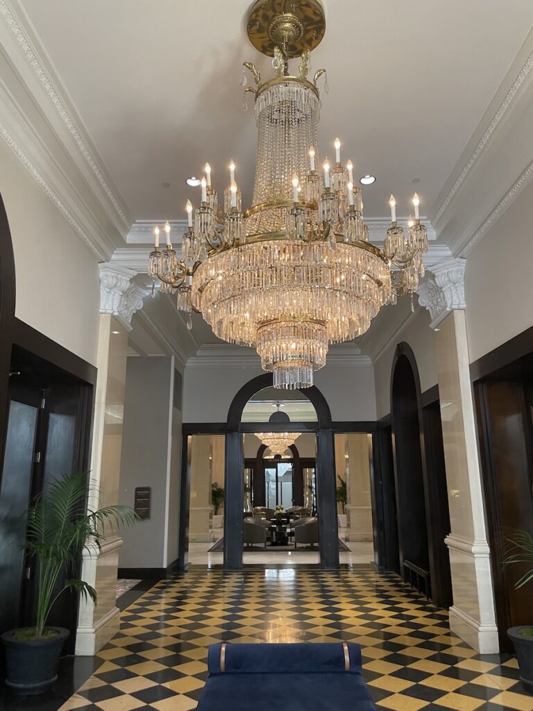Review & Video: The US Grant, San Diego, a Luxury Collection Hotel Hawaii Calling a chandelier in a hallway