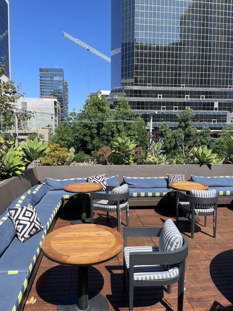 Review & Video: Hotel Republic San Diego, Autograph Collection Hawaii Calling a rooftop patio with a tall building in the background