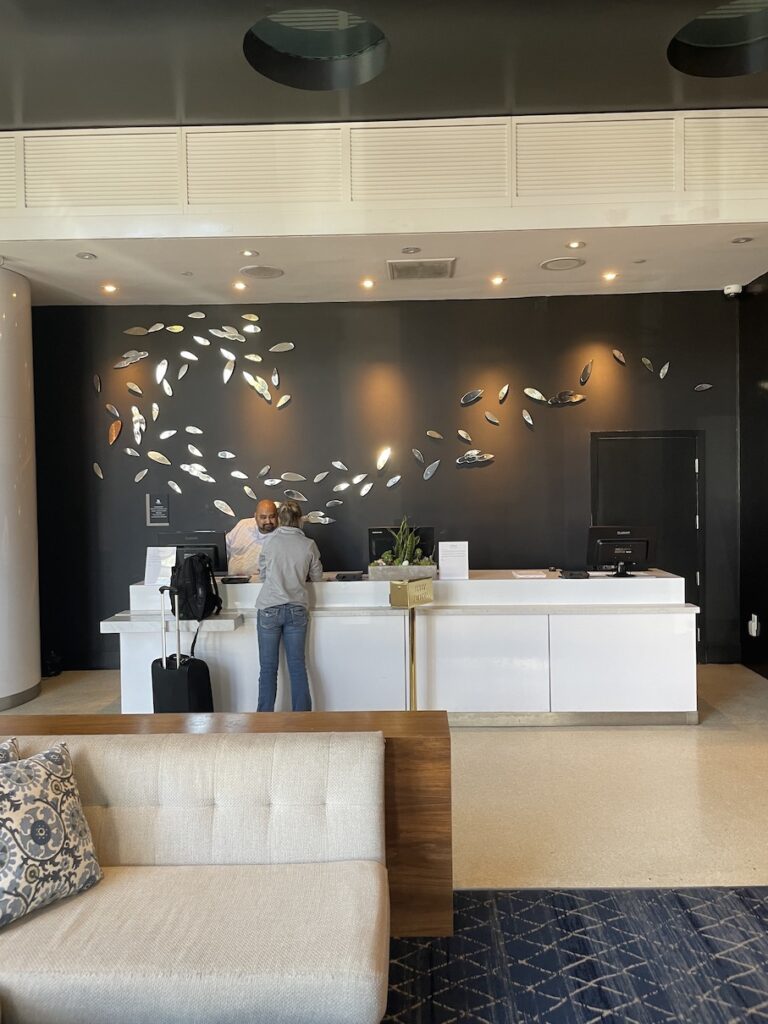 Review & Video: Hotel Republic San Diego, Autograph Collection Hawaii Calling a man standing at a reception desk