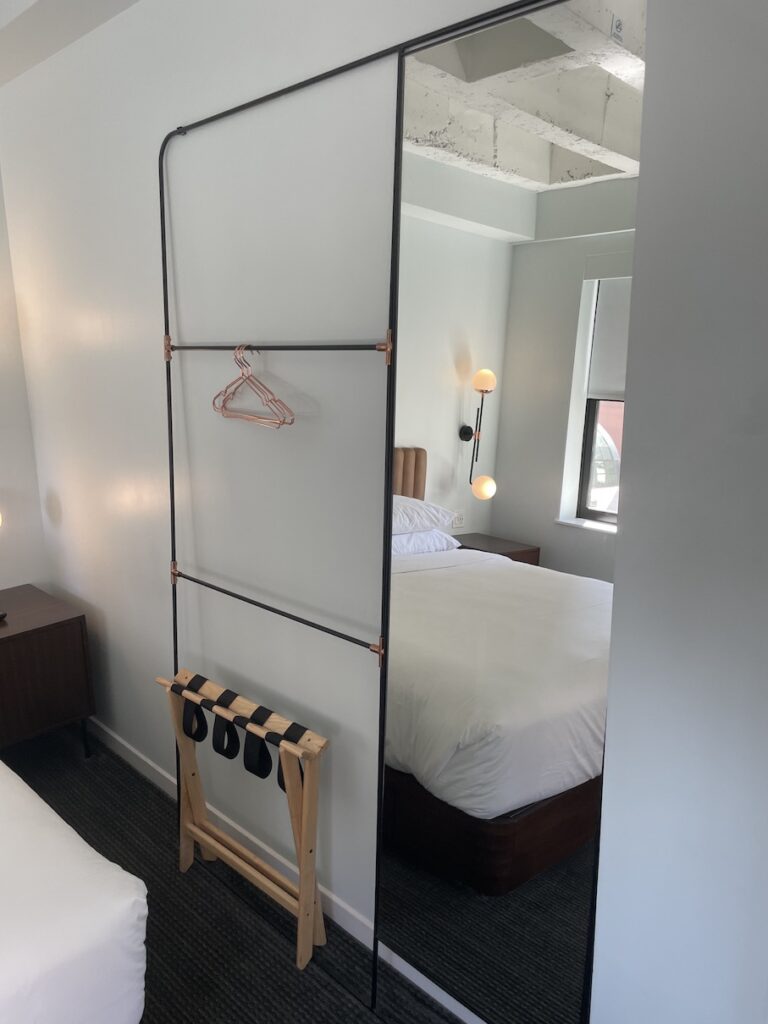 Review & Video: The Guild Hotel, San Diego, a Tribute Portfolio Hotel Hawaii Calling a mirror with a swinger and a bed
