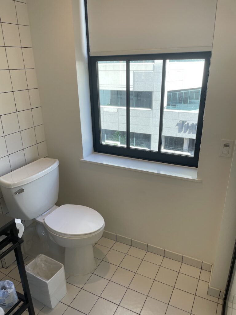 Review & Video: The Guild Hotel, San Diego, a Tribute Portfolio Hotel Hawaii Calling a white toilet in a bathroom