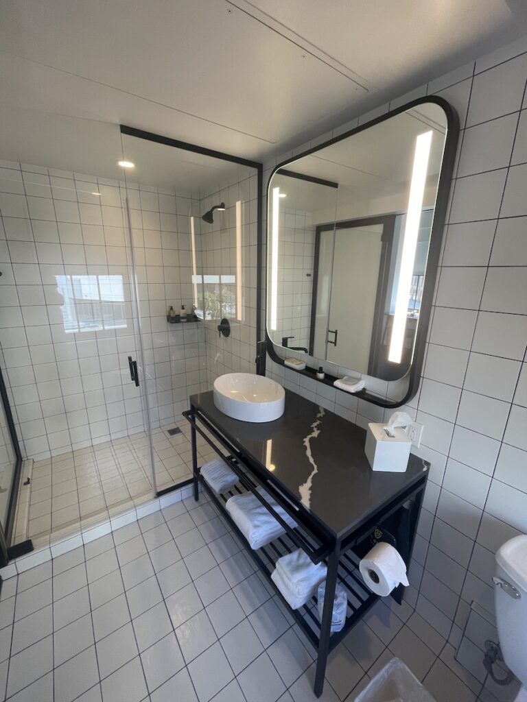 Review & Video: The Guild Hotel, San Diego, a Tribute Portfolio Hotel Hawaii Calling a bathroom with a mirror and a sink