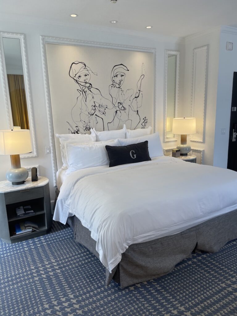 Review & Video: The US Grant, San Diego, a Luxury Collection Hotel Hawaii Calling a bed with a white bedding and a black and white picture on the wall