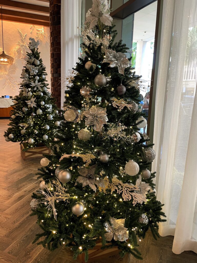 17 Gorgeous Waikiki Hotel Christmas Trees Hawaii Calling a group of christmas trees in a room