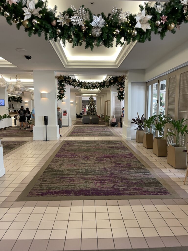17 Gorgeous Waikiki Hotel Christmas Trees Hawaii Calling a large hall with plants and a tree
