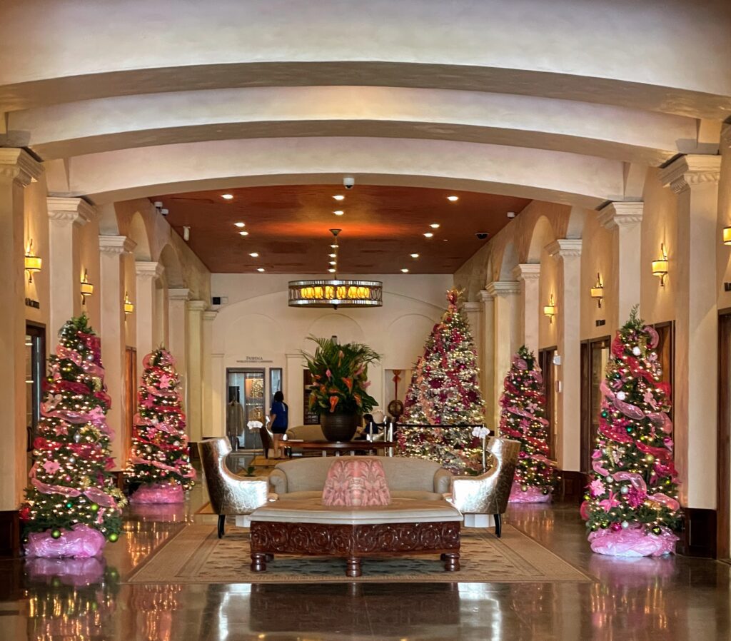 17 Gorgeous Waikiki Hotel Christmas Trees Hawaii Calling a lobby with christmas trees and a couch